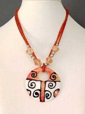 Shell pendant necklace with seed bead strands